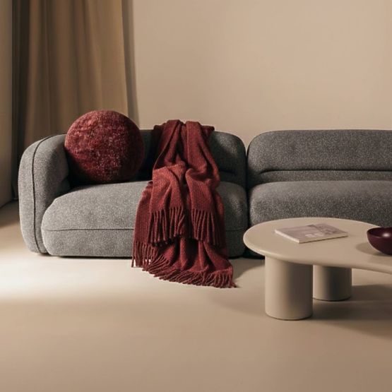 Four-seater living room sofa Luvio gray, rounded shapes